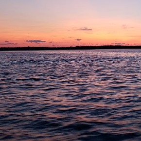 Photo of ocean at sunset.